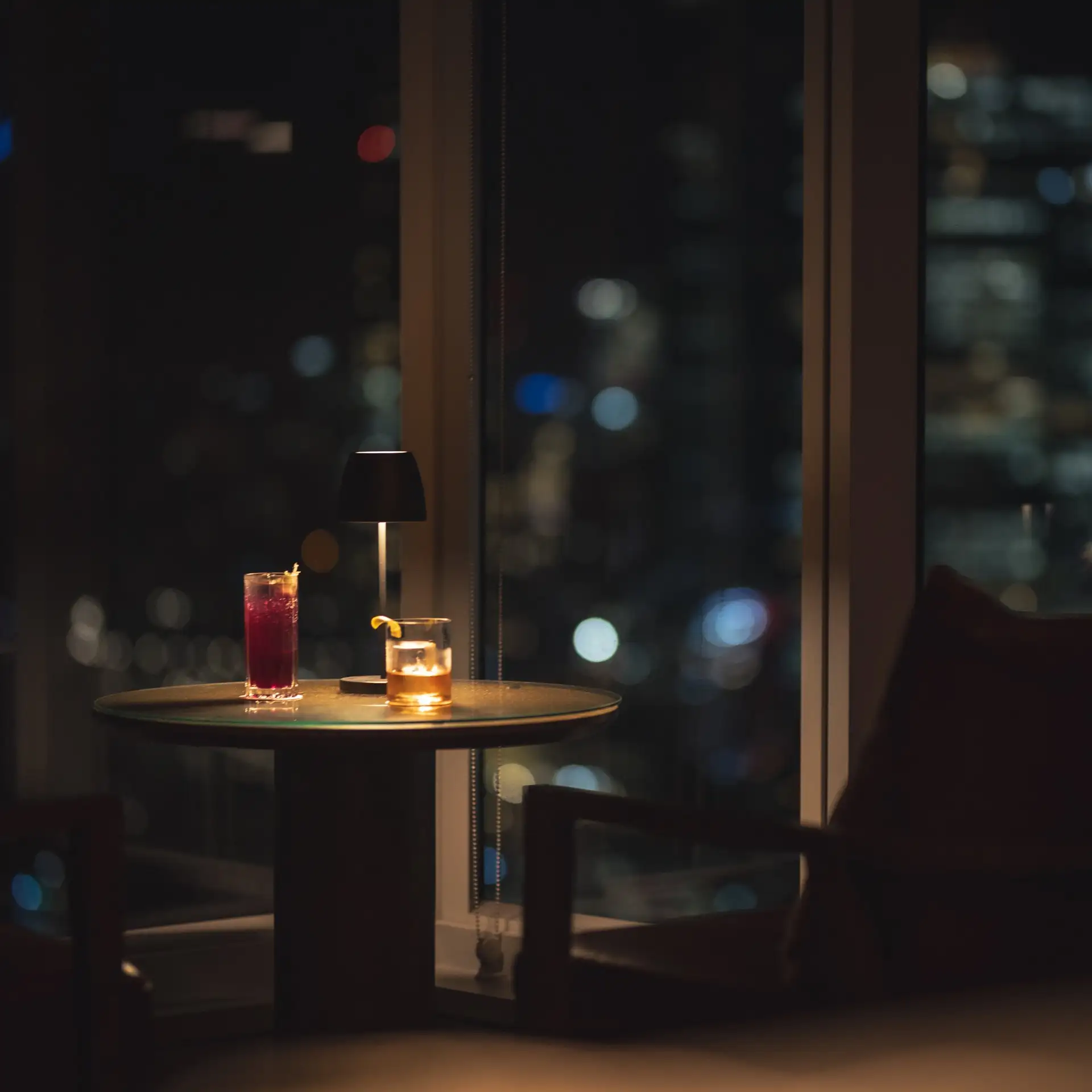 Cocktails with a nighttime city view