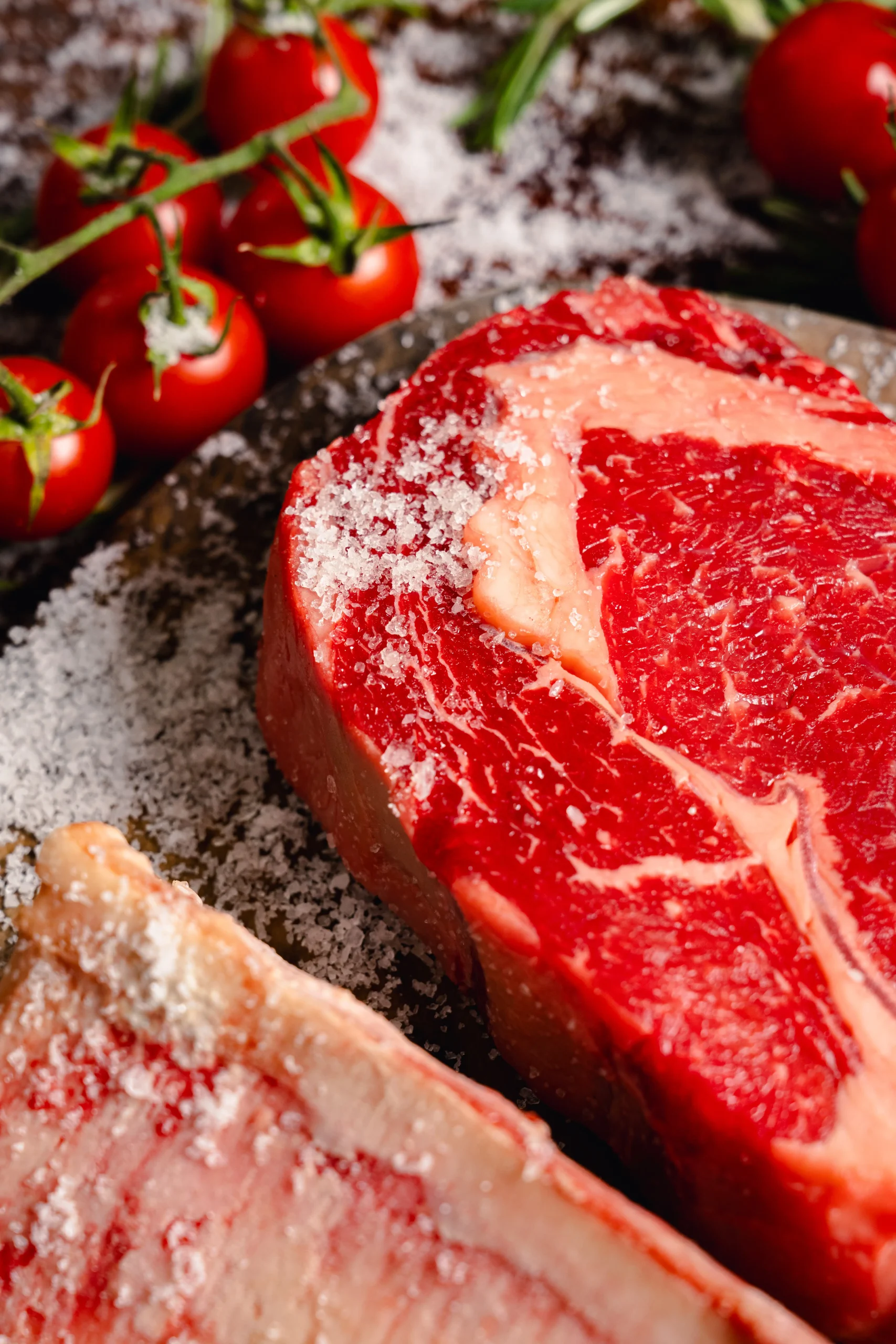 Rich blood red raw steak with sea salt