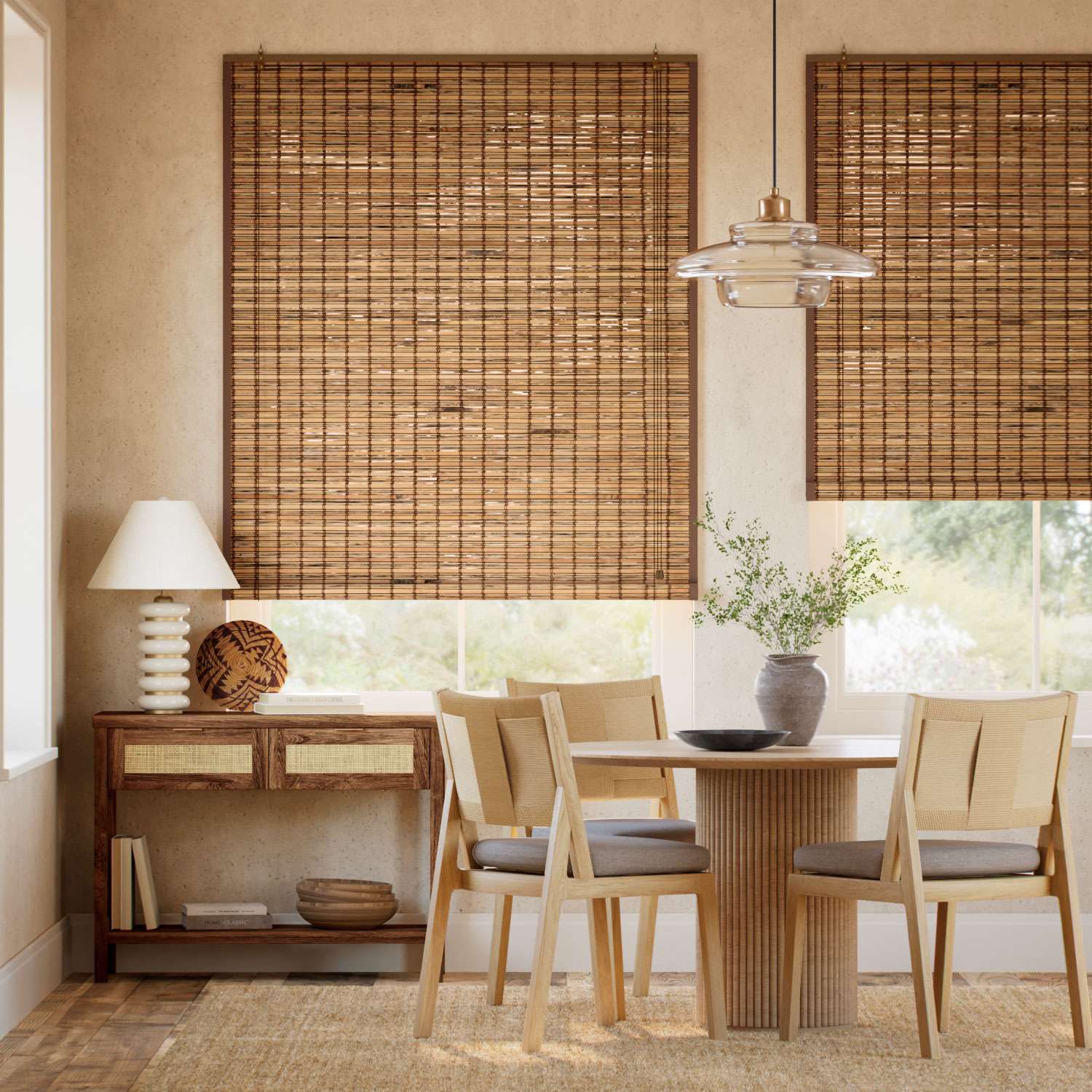Keep your home cool during a heatwave by using a neutral-toned interior featuring a dining table and natural bamboo blinds.